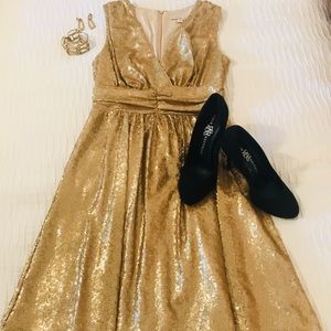 Eva Mendes - Gold cocktail dress. XS